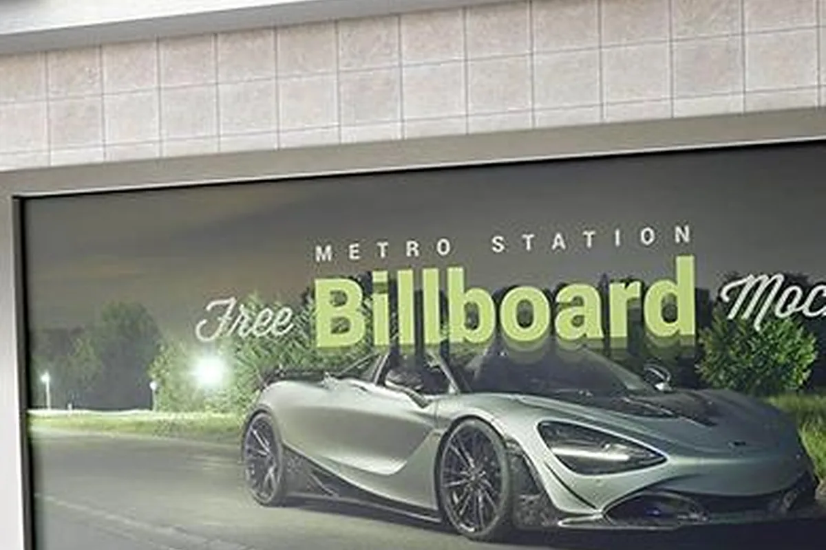 Large-format metal advertising lightbox installed in a Singapore subway station